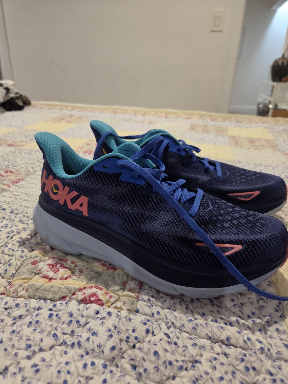 HOKA Navy and Teal Running Shoes with Pink Accents